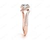 Round Cut Twist band claw set diamond with grain set side stone in 18K Rose