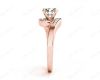 Round Cut Four Claw Set Diamond Ring with Channel Set Stones Down the Shoulders in 18k Rose