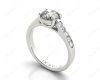 Round Cut 4 Claw Side Stone Engagement Ring with Channel Set Side Stones in Platinum