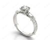 Round Cut Vintage Style Three Stone Engagement Ring with Tapered Baguette Bezel Set and Pavé Set Side Stones  in 18K White