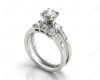 Round Cut Diamond trilogy wedding set rings with claw set side stone in Platinum