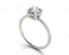 Round Cut Four Claw Set Diamond Ring with Scallop Set Round Cut Diamonds Pave Setting with two Side Halos and on the Band in Platinum