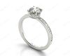 Round Cut Four Claw Set Diamond Ring with Round Share Prong Set Side Stones in Platinum