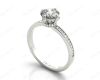 Round Cut Four Claw Set Hidden Halo Diamond Ring with Round Cut Diamonds Pave Set Down the Shoulders and on the Setting in Platinum