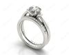 Round cut diamond wedding set rings with channel set shoulders in Platinum