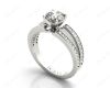 Round Cut 4 Claw Split Shank Engagement Ring with Grain Set Side Stones in Platinum