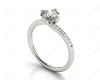 Round Cut Four Claws Prong set Twist Diamond Ring in Platinum