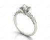 Princess Cut Four Claw Set Diamond Ring with Princess Cut Stones Down the Shoulders and Brilliant Stones on Sides in Platinum