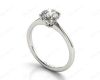 Round Cut Four Claw Set Diamond Ring With a Plain Band in 18K White