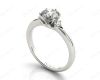 Round Cut Claw Set Trilogy Diamond Ring with Plain Band in Platinum