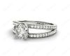 Round Cut 4 Claw Split Shank Engagement Ring with Grain Set Side Stones in Platinum