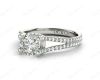 Round cut diamond ring with claw set centre stone in Platinum