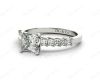 Princess Cut Four Claw Set Diamond Ring with Princess Cut Stones Down the Shoulders and Brilliant Stones on Sides in Platinum