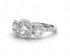 Round Cut Triple Halo Diamond Engagement ring with claw set centre stone in Platinum