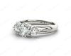 Round Cut Trilogy Diamond Engagement Ring cross-over setting in Platinum