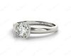 Round Cut Bezel Set Diamond Ring on a Plain Band in Platinum