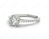 Vintage Style Round Cut Four Claw Set Diamond Ring with Side Halo and Round Cut Diamonds Claw Set on the Band in Platinum