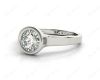 Round Cut Bezel Set Solitaire Engagement Ring With a Plain Band in Platinum