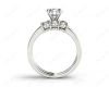 Round Cut Diamond trilogy wedding set rings with claw set side stone in Platinum