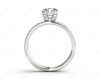 Round Cut Four Double Claw Set Diamond Ring with Pave Set Diamonds Down The Shoulders in Platinum