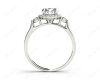 Round Cut Halo Trilogy diamond ring with pave set side stone in 18K White