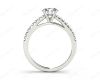 Round Cut Four Claw Set Diamond Ring with Round Pave Set Stones Down the Shoulders in Platinum