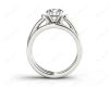 Round cut diamond wedding set rings with channel set shoulders in Platinum