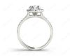 Round Cut Halo Diamond Engagement ring with claw set centre stone in 18K White