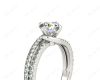 Round Cut Split Shank Diamond Engagement Ring with a Twist Band and Pave Set Side Stones in Platinum