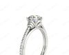 Round Cut Four Claw Set Diamond Ring with Pave Set Diamonds on the Band in 18K White