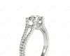 Round cut diamond ring with claw set centre stone in 18K White