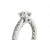 Round Cut Four Claw Set Diamond Ring with Pave Set Stones Down the Shoulders and on Both Sides in Platinum