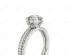 Round Cut Four Double Claw Set Diamond Ring with Pave Set Diamonds Down The Shoulders in Platinum