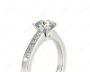 Round cut diamond ring with four claws set centre stone in 18K White