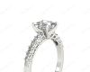 Princess Cut Four Claw Set Diamond Ring with Princess Cut Stones Down the Shoulders and Brilliant Stones on Sides in Platinum