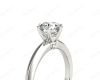 Round Cut Six Claw Set Diamond Ring With Round Cut Diamonds Pave Set on the Sides with a Plain Band in Platinum