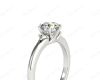 Round Cut Claw Set Trilogy Diamond Ring with Plain Band in Platinum