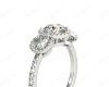 Round Cut Triple Halo Diamond Engagement ring with claw set centre stone in Platinum