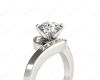 Round Cut Four Claw Set Diamond Ring with Channel Set Stones Down the Shoulders in Platinum