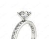 Round Cut Four Claw Set Diamond Ring with Channel Set Side Stones Down the Shoulders in 18k White Gold