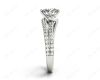 Round Cut Split Shank Diamond Engagement Ring with a Twist Band and Pave Set Side Stones in Platinum