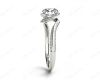 Round Cut Twist band claw set diamond with grain set side stone in 18K White