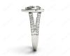 Pear Shape Halo Diamond ring with claw set centre stone in Platinum