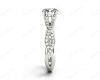 Twist Band Round Cut Four Claw Set Diamond Engagement Ring with Pave Set Stones Down the Shoulders in Platinum