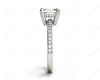 Emerald Cut Four Claw Diamond Ring with grain set side stones in Platinum