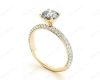 Round Cut claw set diamond ring with micro pave set side stone in 18K Yellow