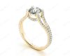 Round cut diamond ring with claw set centre stone in 18K Yellow