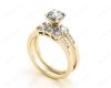 Round Cut Diamond trilogy wedding set rings with claw set side stone in 18K Yellow