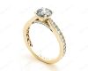 Round Cut Four Claw Set Diamond Ring with Pave Set Stones Down the Shoulders and on Both Sides in 18K Yellow