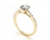 Round Cut Four Claw Set Diamond Ring with Round Pave Set Stones Down the Shoulders in 18K Yellow